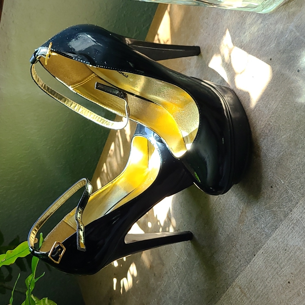6" black patent leather platform heels. Black size 8.5